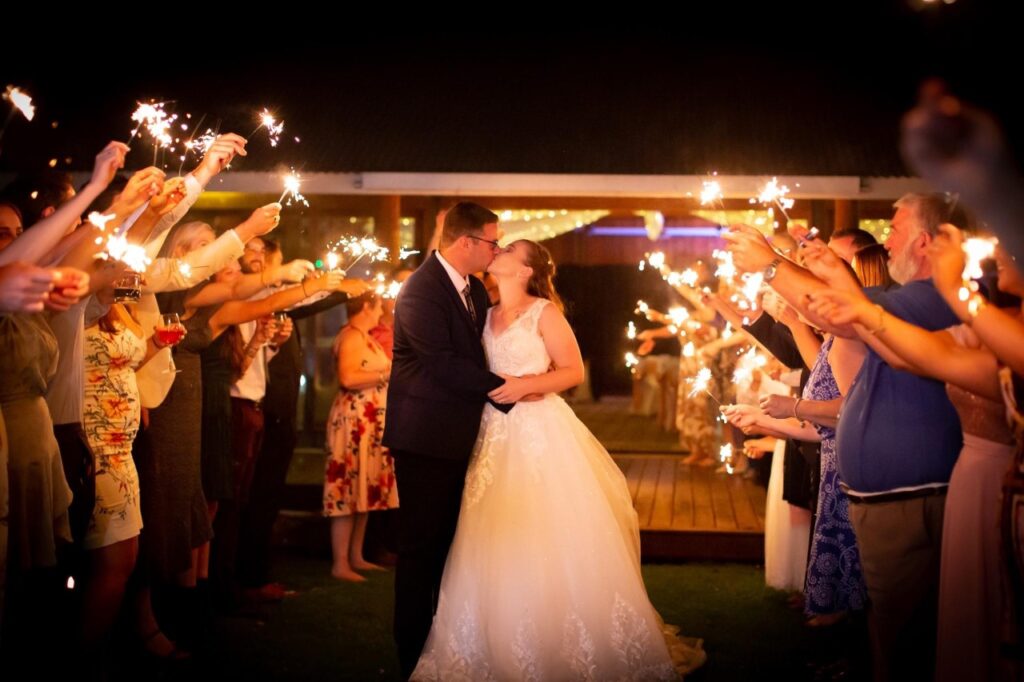 Rosie and Adam Dubbo Zoo wedding grand exit to sparklers