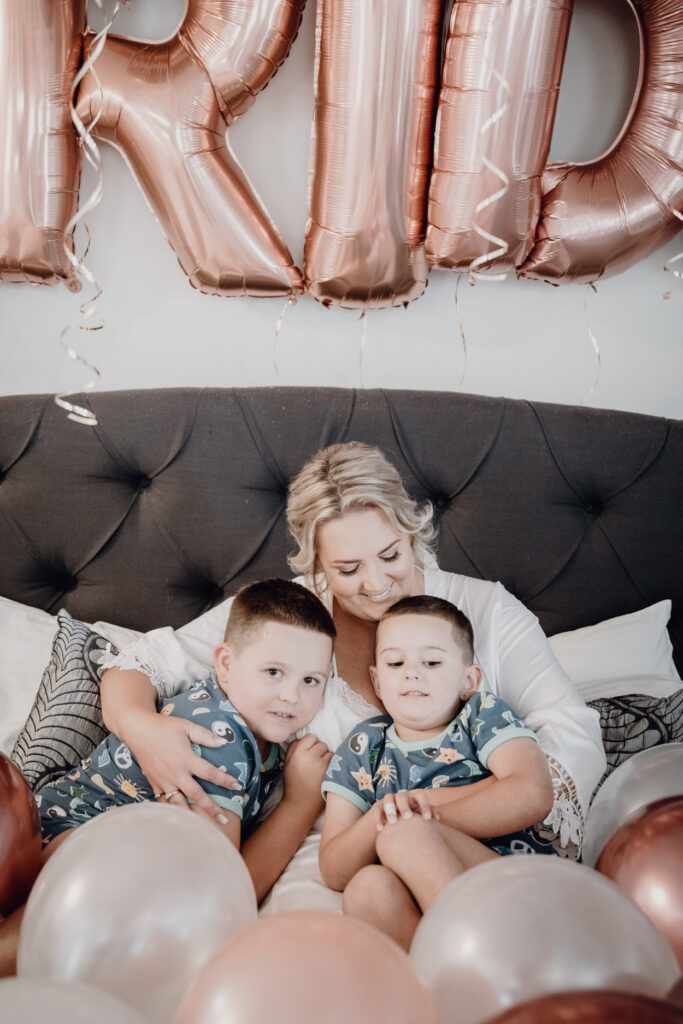 Bride on her wedding morning with sons